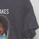 Close-up of the sleeve on the Vintage Modern Bob Ross "Make Them Birds" T-Shirt - M