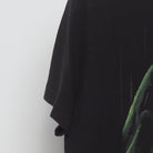 Close-up of the sleeve on the Vintage Modern Bob's Burgers "My Neighbor Kuchi Kopi" T-Shirt - S