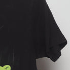 Close-up of the sleeve on the Vintage Modern Bob's Burgers "My Neighbor Kuchi Kopi" T-Shirt - S