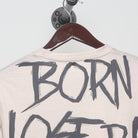 Close-up of the collar and tag on the Vintage Modern "Born to Lose Raised to Win" T-Shirt - L