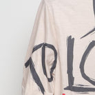 Close-up of the sleeve on the Vintage Modern "Born to Lose Raised to Win" T-Shirt - L