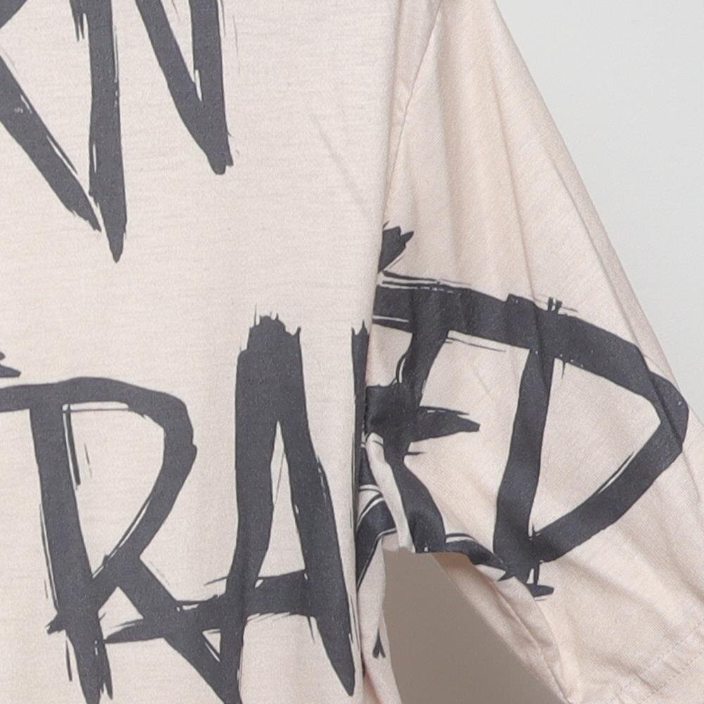 Close-up of the sleeve on the Vintage Modern "Born to Lose Raised to Win" T-Shirt - L