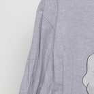 Close-up of the sleeve on the Vintage Modern Buc-ee's "Never Eat Bayou Self" T-Shirt - XL