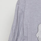 Close-up of the sleeve on the Vintage Modern Buc-ee's "Never Eat Bayou Self" T-Shirt - XL