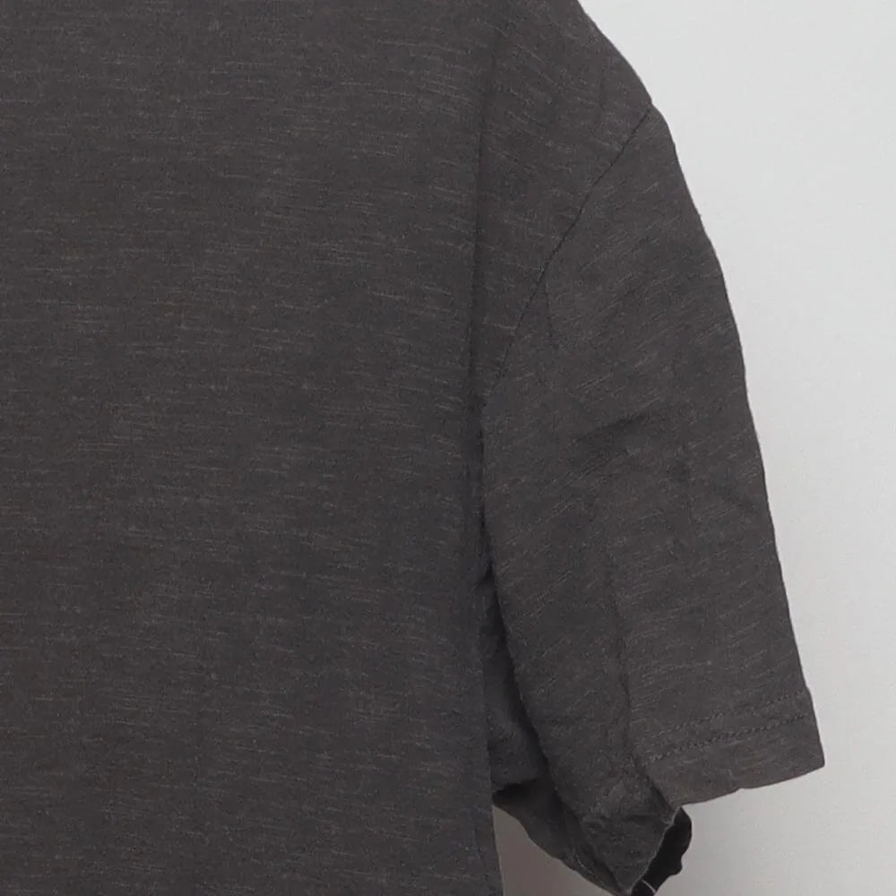 Close-up of the sleeve on the Vintage Modern Caesars "Roman Helmet" T-Shirt - L