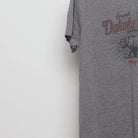 Close-up of the sleeve on the Vintage Modern Dakota Grizzly Bear Graphic Tee M