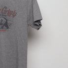 Close-up of the sleeve on the Vintage Modern Dakota Grizzly Bear Graphic Tee M