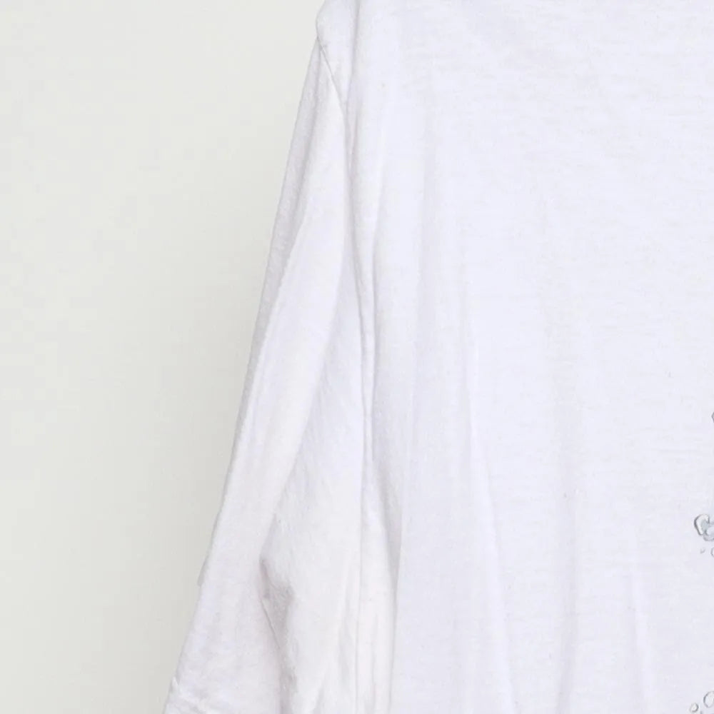 Close-up of the sleeve on the Vintage Modern Demon Slayer "Tanjiro Mugen Train" T-Shirt - M