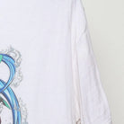 Close-up of the sleeve on the Vintage Modern Demon Slayer "Tanjiro Mugen Train" T-Shirt - M