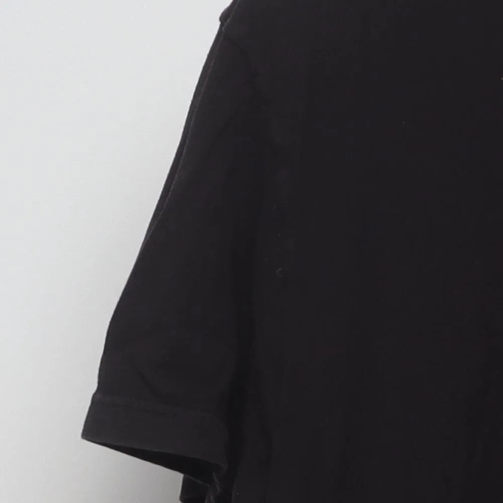 Close-up of the sleeve on the Vintage Modern Elton John "Rocket Man" T-Shirt - L