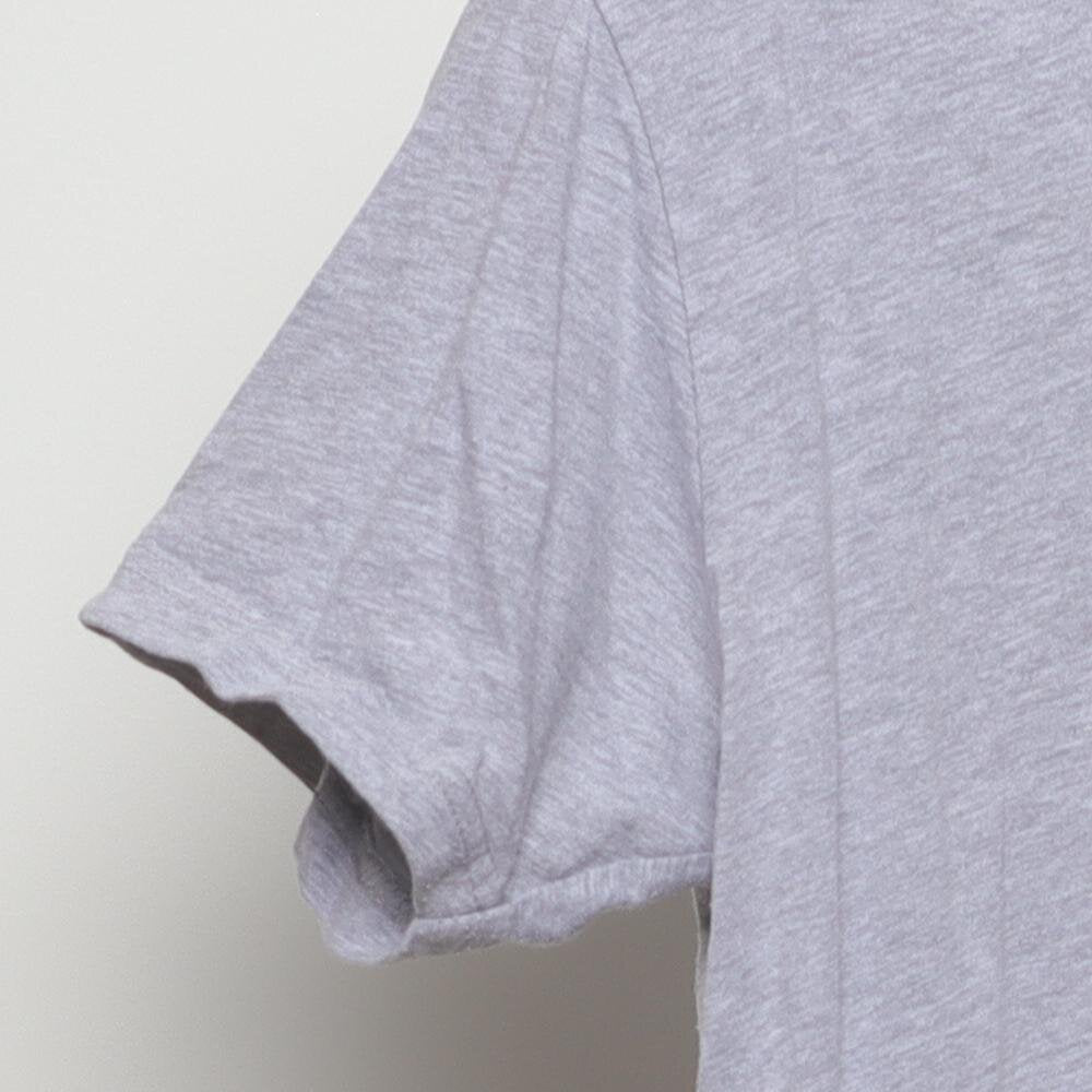 Close-up of the sleeve on the Vintage Modern Englewood Grass Farm "Cycling Cow" T-Shirt - M