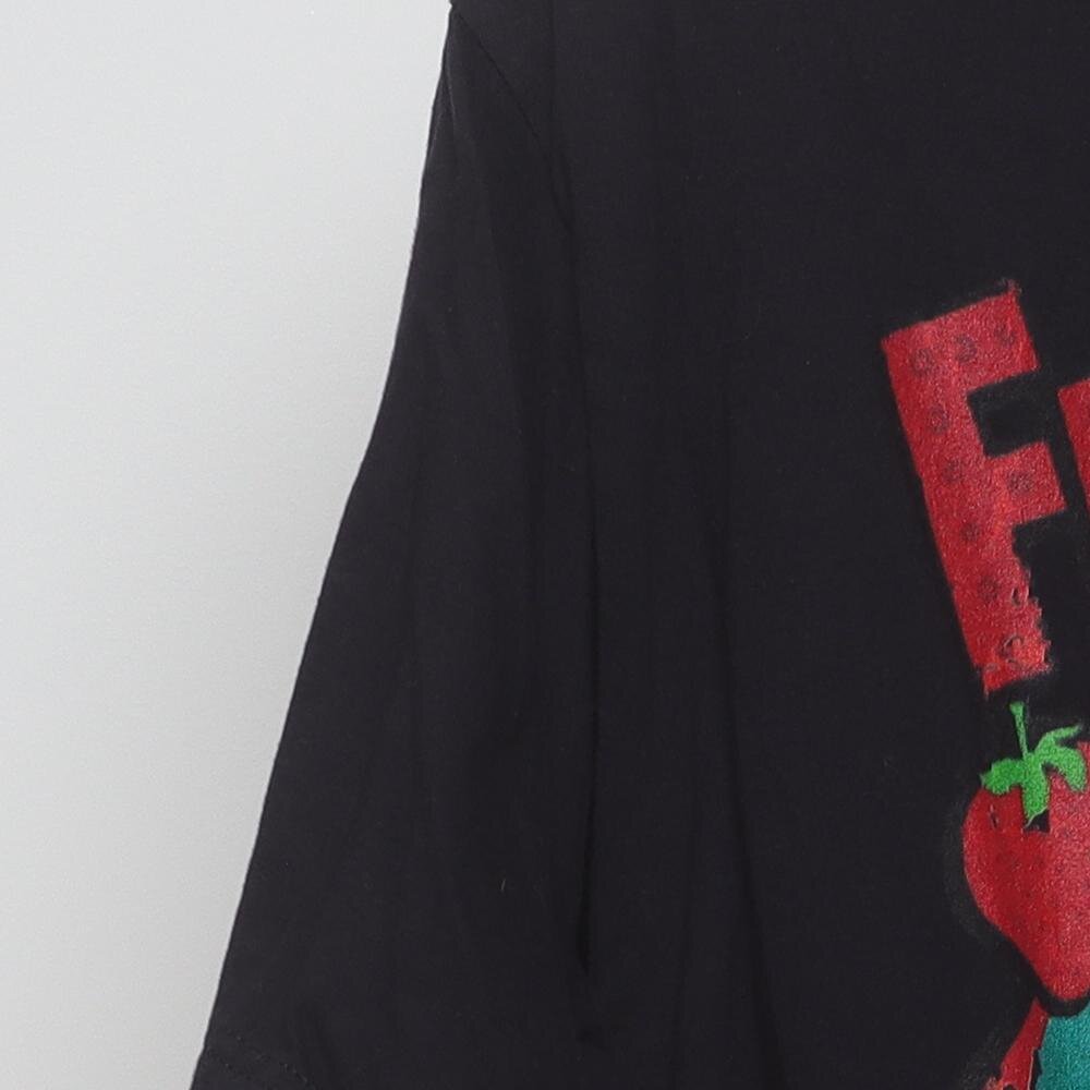 Close-up of the sleeve on the Vintage Modern General Mills "Franken Berry" T-Shirt - L