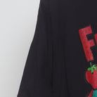 Close-up of the sleeve on the Vintage Modern General Mills "Franken Berry" T-Shirt - L