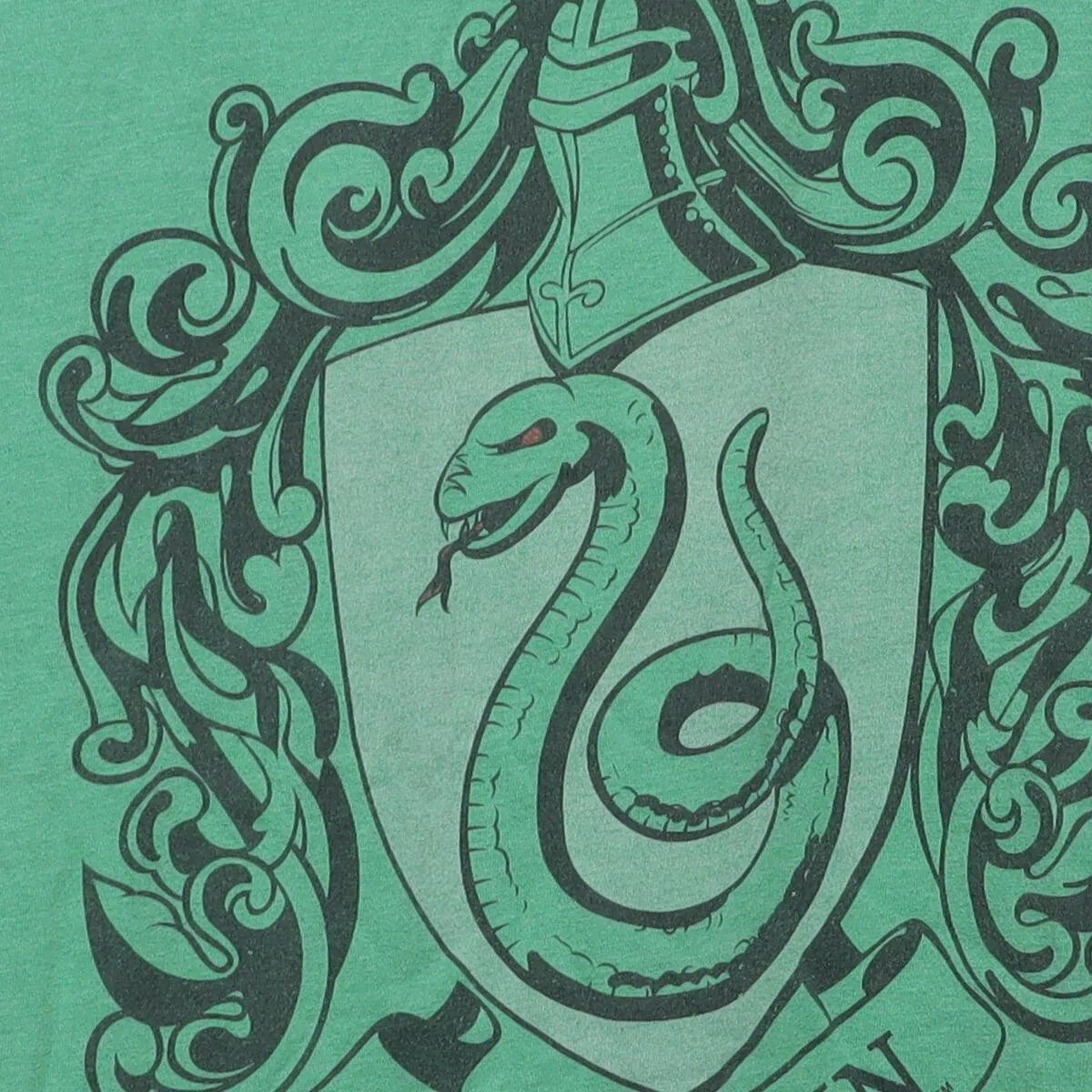 Close-up of the main graphic on the Vintage Modern Harry Potter "Slytherin Crest" T-Shirt - L