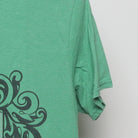 Close-up of the sleeve on the Vintage Modern Harry Potter "Slytherin Crest" T-Shirt - L