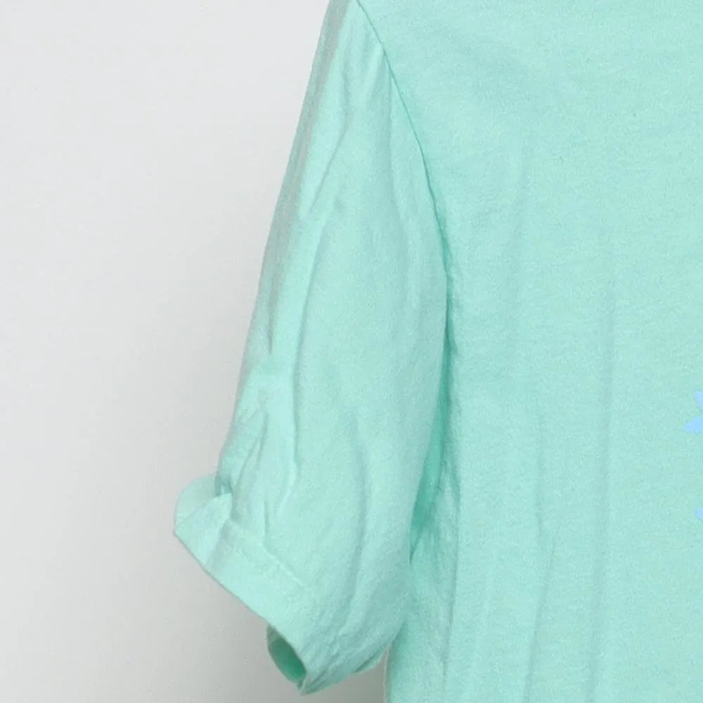 Close-up of the sleeve on the Vintage Modern HK "Found In Paradise" T-Shirt - S