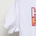 Close-up of the sleeve on the Vintage Modern Hunter x Hunter "Main Cast" T-Shirt - S