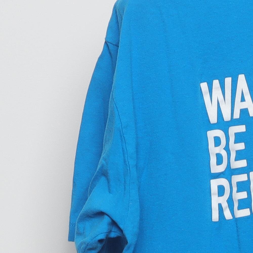 Close-up of the sleeve on the Vintage Modern M&M's "Wake Up. Be Awesome. Repeat." T-Shirt - XL