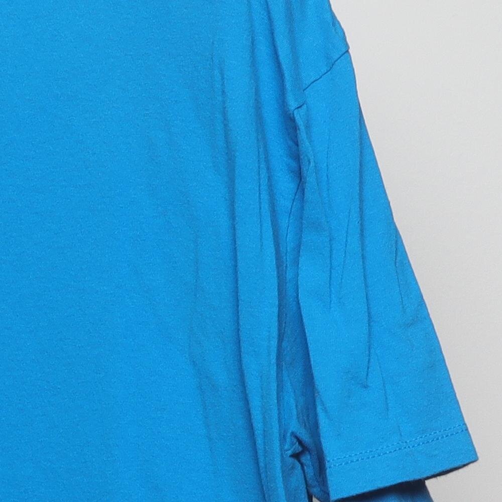 Close-up of the sleeve on the Vintage Modern M&M's "Wake Up. Be Awesome. Repeat." T-Shirt - XL
