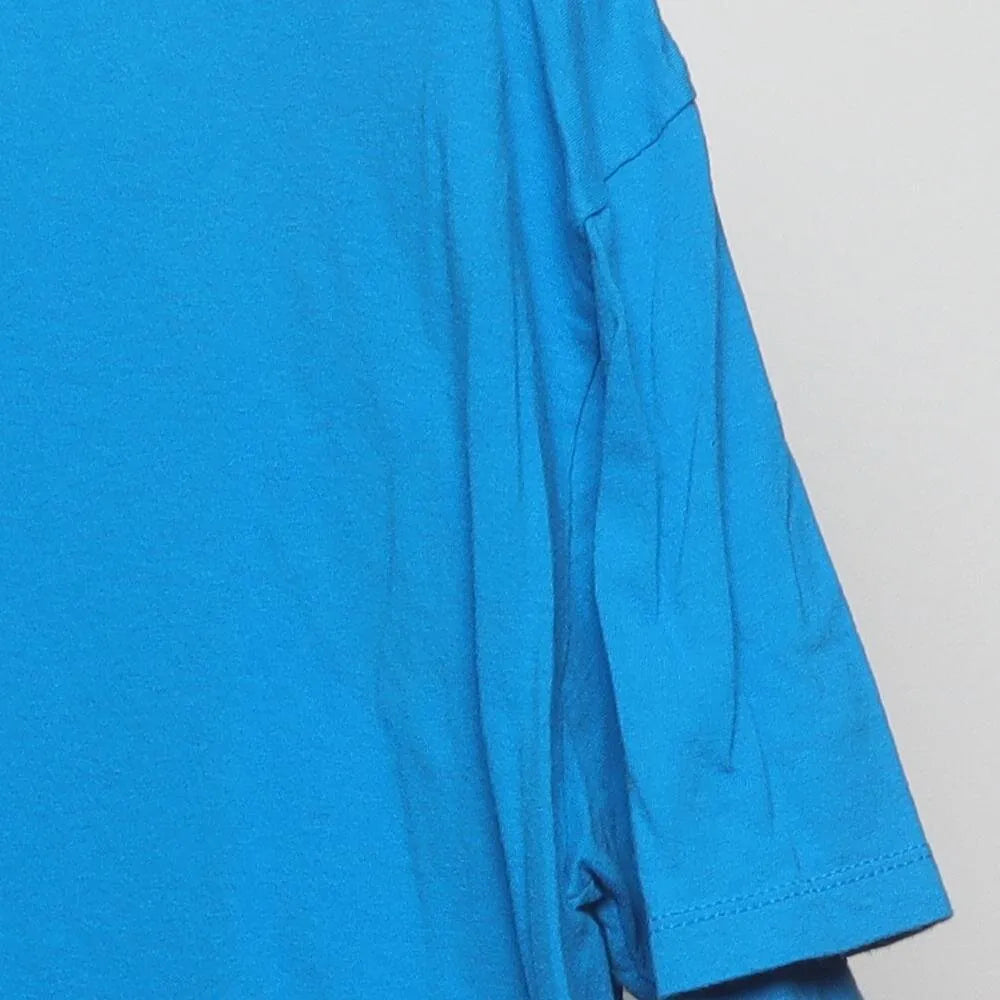 Close-up of the sleeve on the Vintage Modern M&M's "Wake Up. Be Awesome. Repeat." T-Shirt - XL