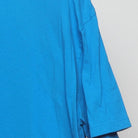 Close-up of the sleeve on the Vintage Modern M&M's "Wake Up. Be Awesome. Repeat." T-Shirt - XL