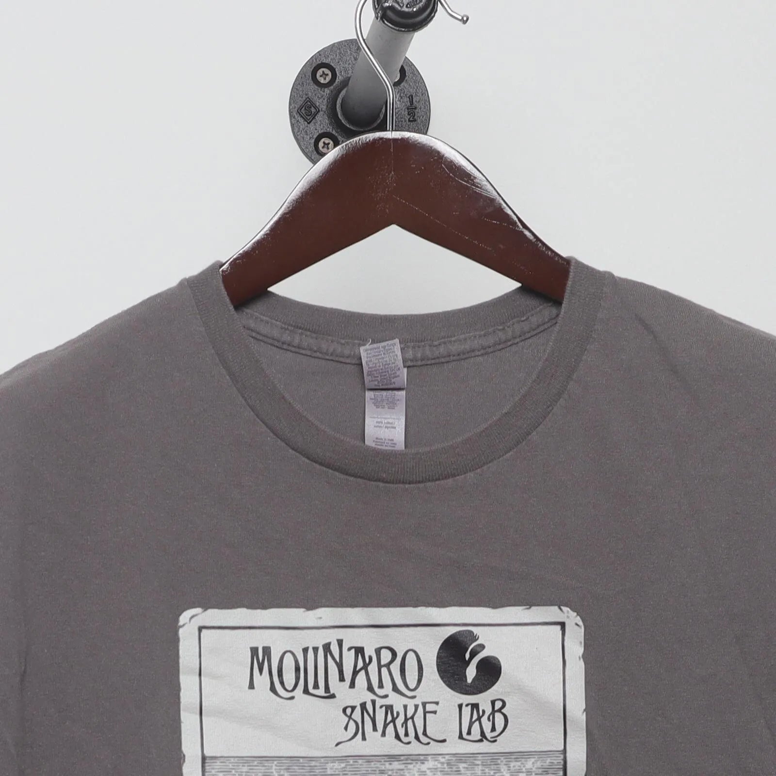 Close-up of the collar and tag on the Vintage Modern Molinaro Snake Lab "Summoning Tarot Card" T-Shirt - M