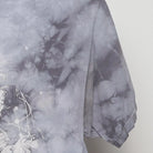 Close-up of the sleeve on the Vintage Modern NASA "Astronaut Tie-Dye" T-Shirt - S