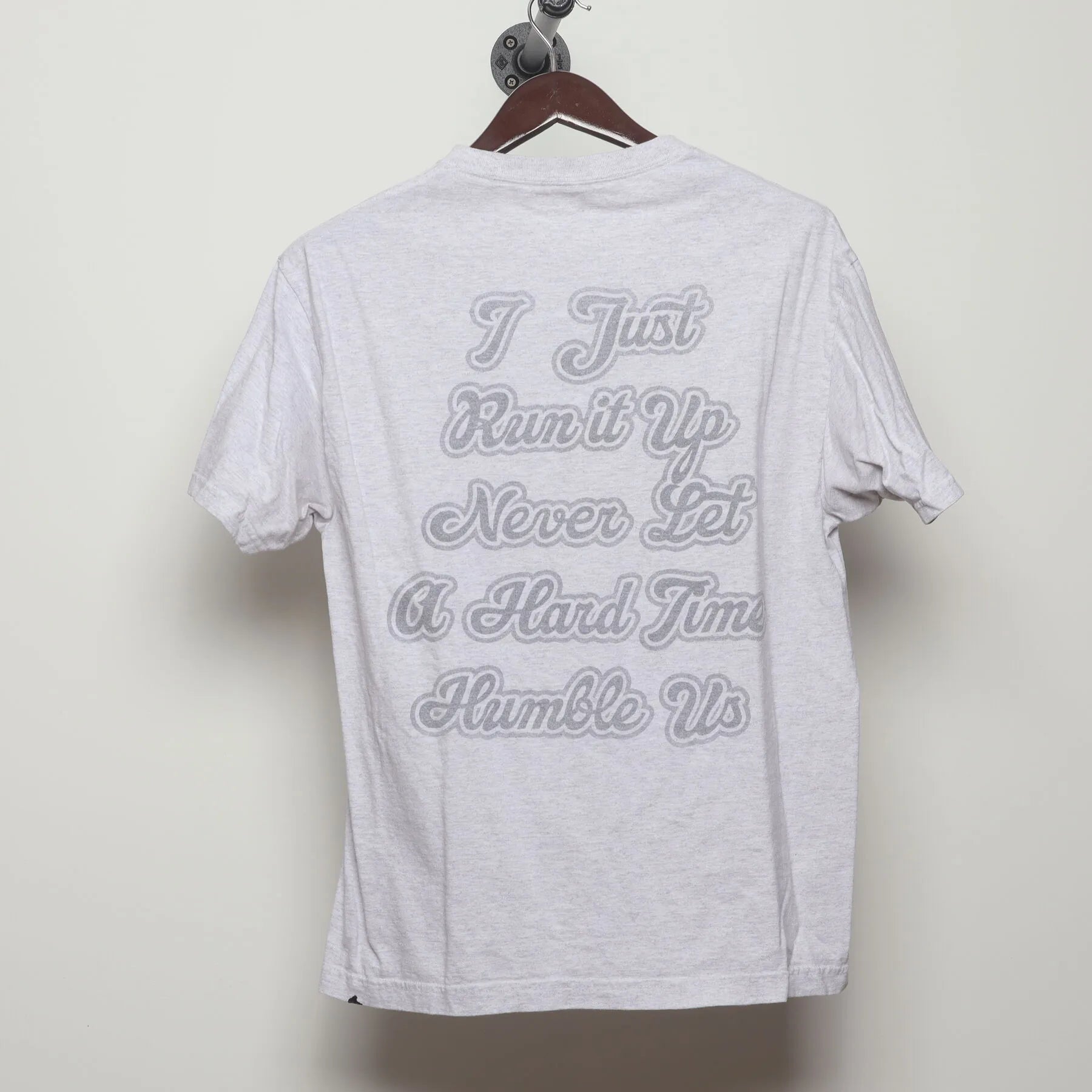 Back view of Vintage Modern Nipsey Hussle "Never Let A Hard Time Humble Us" T-Shirt - L