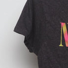 Close-up of the sleeve on the Vintage Modern Nirvana "Tie-Dye Smiley Face" T-Shirt - S