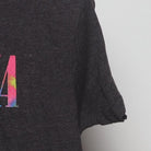 Close-up of the sleeve on the Vintage Modern Nirvana "Tie-Dye Smiley Face" T-Shirt - S