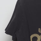 Close-up of the sleeve on the Vintage Modern Oakley "Stacked Logo Graphic" T-Shirt - M