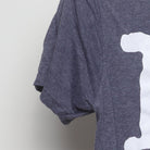 Close-up of the sleeve on the Vintage Modern "PS Dump Your Boyfriend" T-Shirt - XS