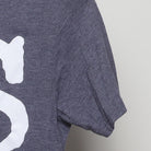 Close-up of the sleeve on the Vintage Modern "PS Dump Your Boyfriend" T-Shirt - XS