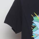 Close-up of the sleeve on the Vintage Modern Rick and Morty "Neon Portrait" T-Shirt - S