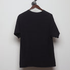 Back view of Vintage Modern Steven Rhodes "Caring for your Demon Cat" T-Shirt - L