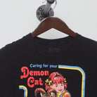 Close-up of the collar and tag on the Vintage Modern Steven Rhodes "Caring for your Demon Cat" T-Shirt - L