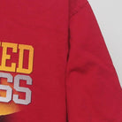 Close-up of the sleeve on the Vintage Modern USC Trojans "Unfinished Business" 2012 Schedule T-Shirt - M