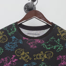 Close-up of the collar and tag on the Vintage Y2K Nickelodeon "Rugrats Neon AOP" T-Shirt - M