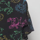 Close-up of the Right sleeve on the Vintage Y2K Nickelodeon "Rugrats Neon AOP" T-Shirt - M