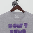 Close-up of the collar and tag on the Vintage 2000s Nike "Don't Pump Fake The Money Shot" T-Shirt - L