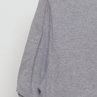 Close-up of the Left sleeve on the Vintage 2000s Nike "Don't Pump Fake The Money Shot" T-Shirt - L