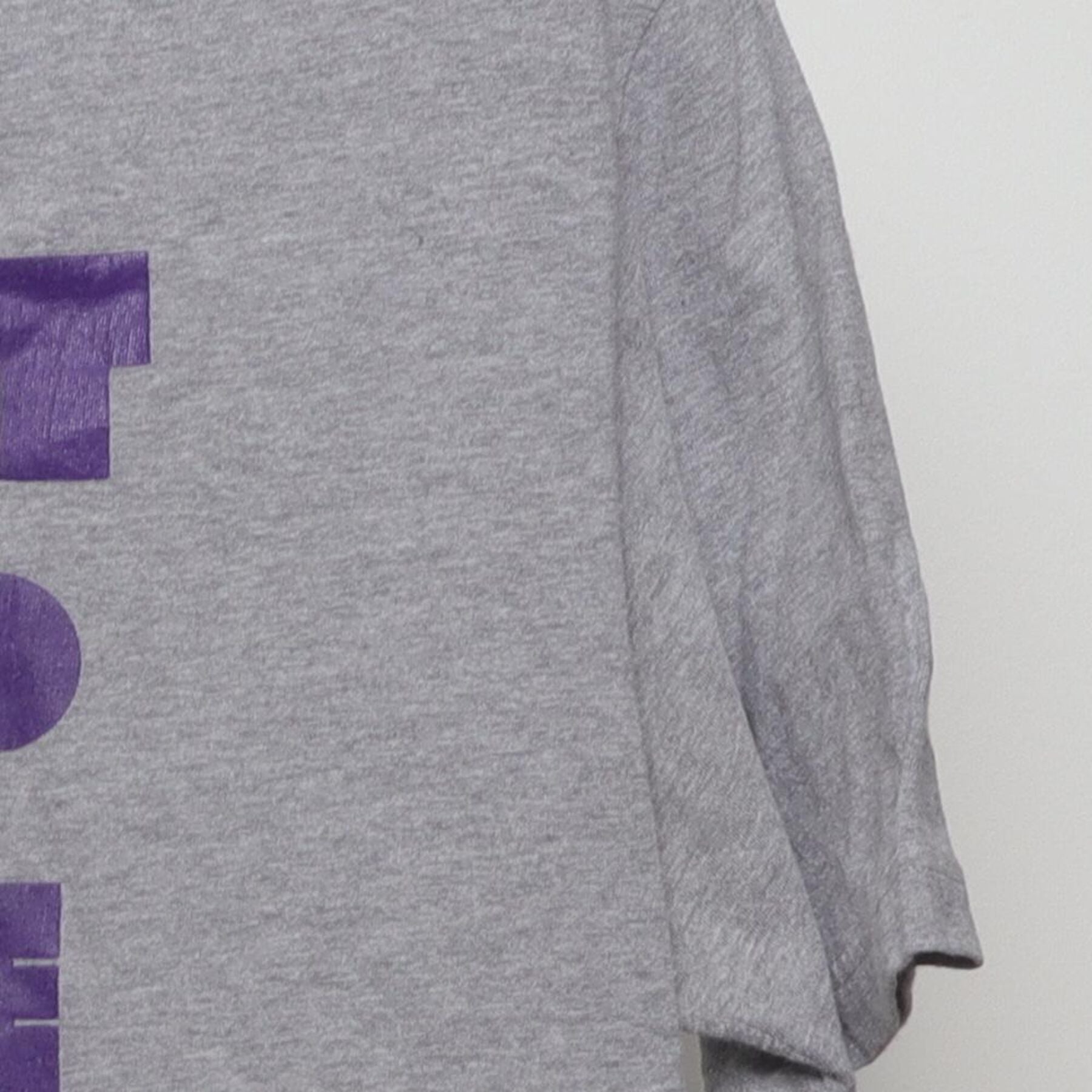 Close-up of the Right sleeve on the Vintage 2000s Nike "Don't Pump Fake The Money Shot" T-Shirt - L