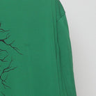 Close-up of the Right sleeve on the Vintage Y2K Nike "Cracked Shield Graphic" T-Shirt - XL