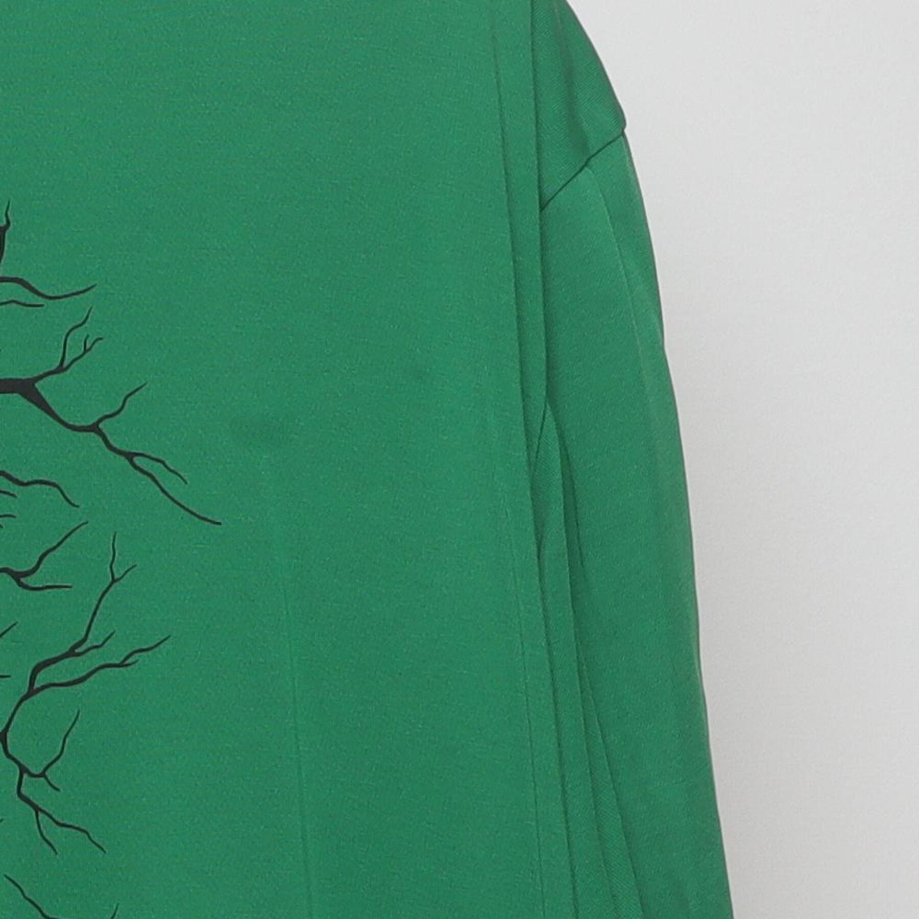 Close-up of the Right sleeve on the Vintage Y2K Nike "Cracked Shield Graphic" T-Shirt - XL