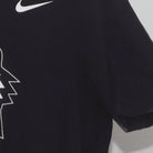 Close-up of the Right sleeve on the Vintage Y2K Nike Tiger Woods "Geometric Tiger Logo" T-Shirt - M