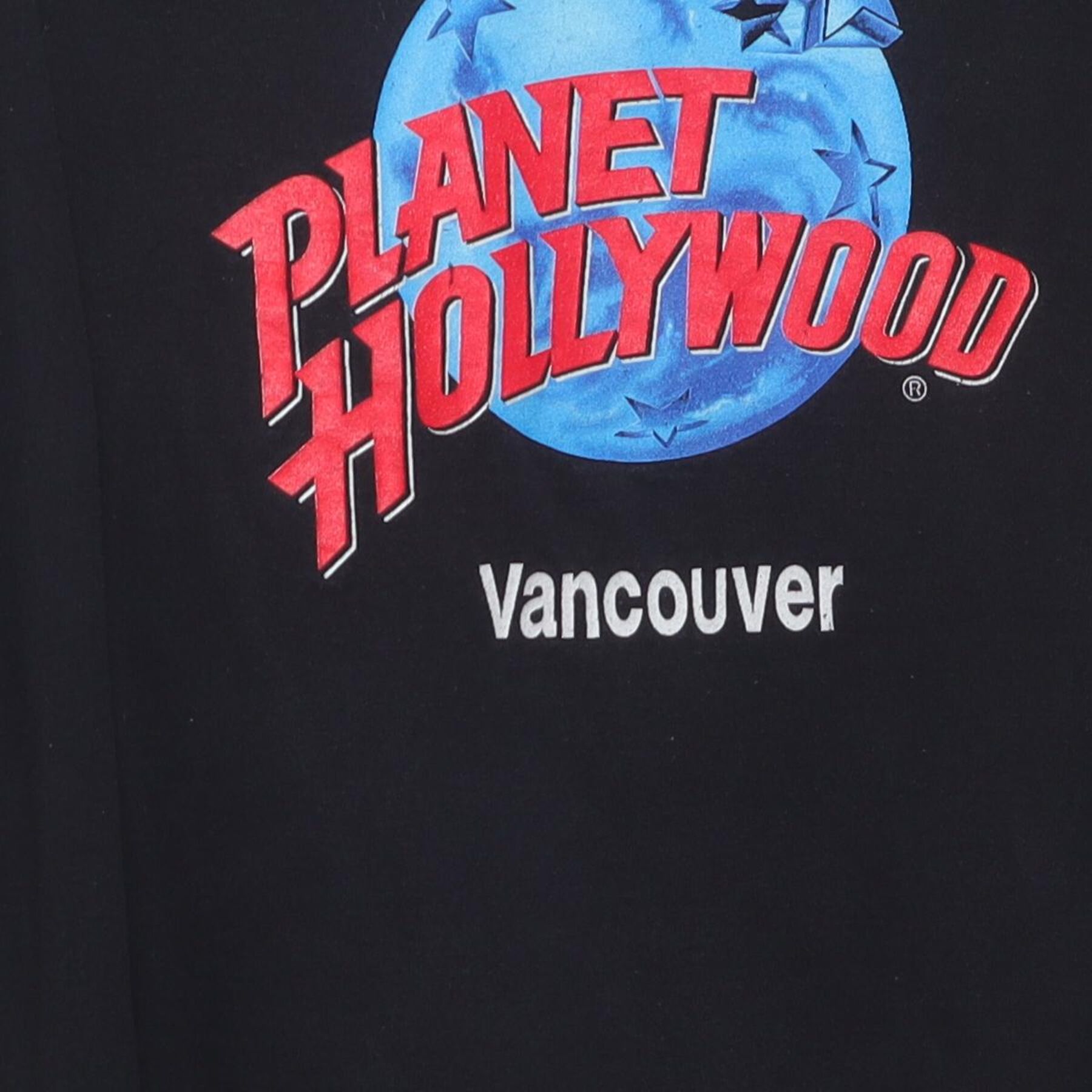 Close-up of the main graphic on the Vintage 1990s Planet Hollywood "Vancouver" T-Shirt - L