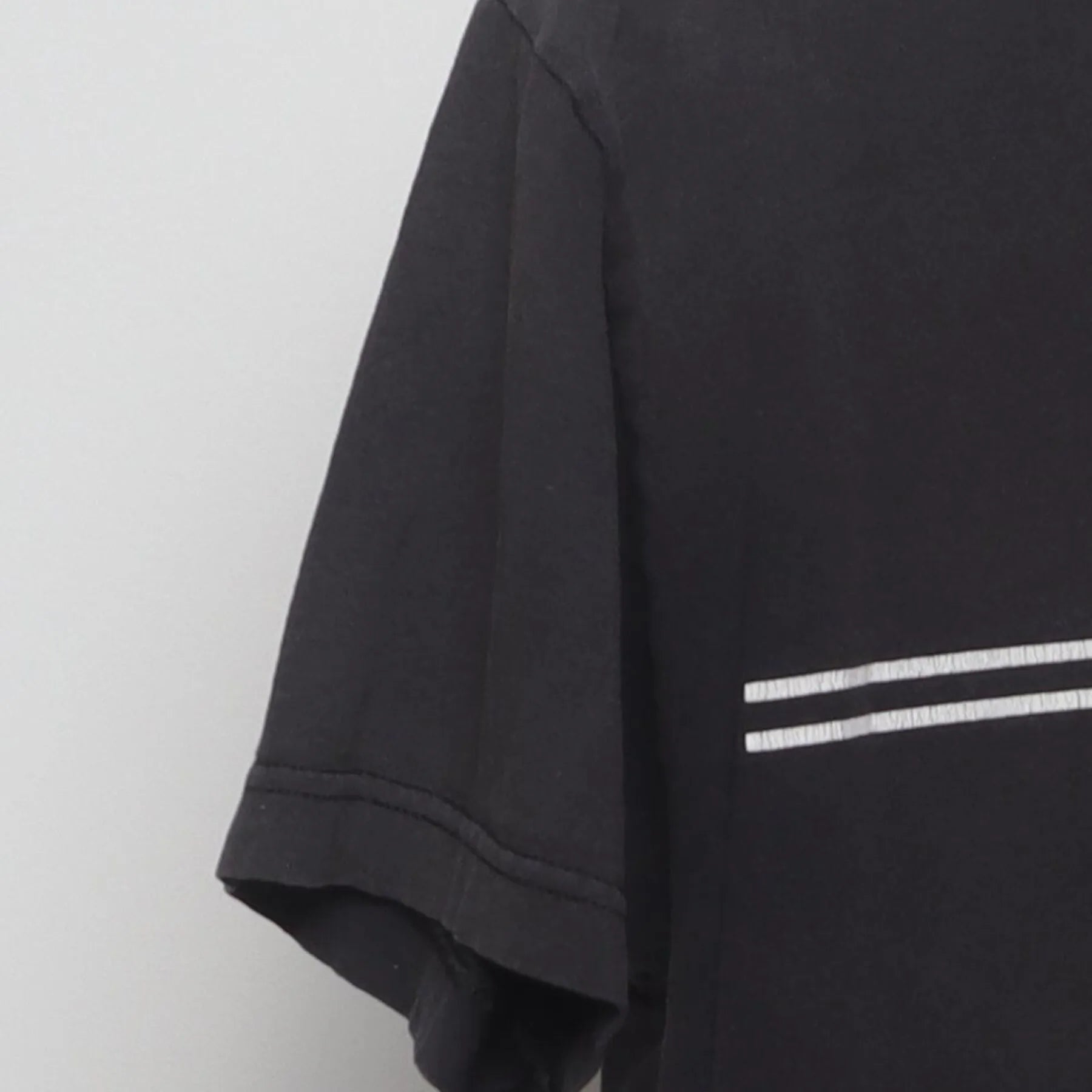 Close-up of the Left sleeve on the Vintage Y2K Santa Cruz Skateboards "Classic Dot" T-Shirt - S
