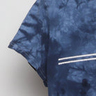 Close-up of the Left sleeve on the Vintage Y2K Santa Cruz Skateboards "Classic Dot Logo Tie-Dye" T-Shirt - S