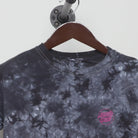 Close-up of the collar and tag on the Vintage Y2K Santa Cruz Skateboards "Multi-Logo Tie-Dye" T-Shirt - XS