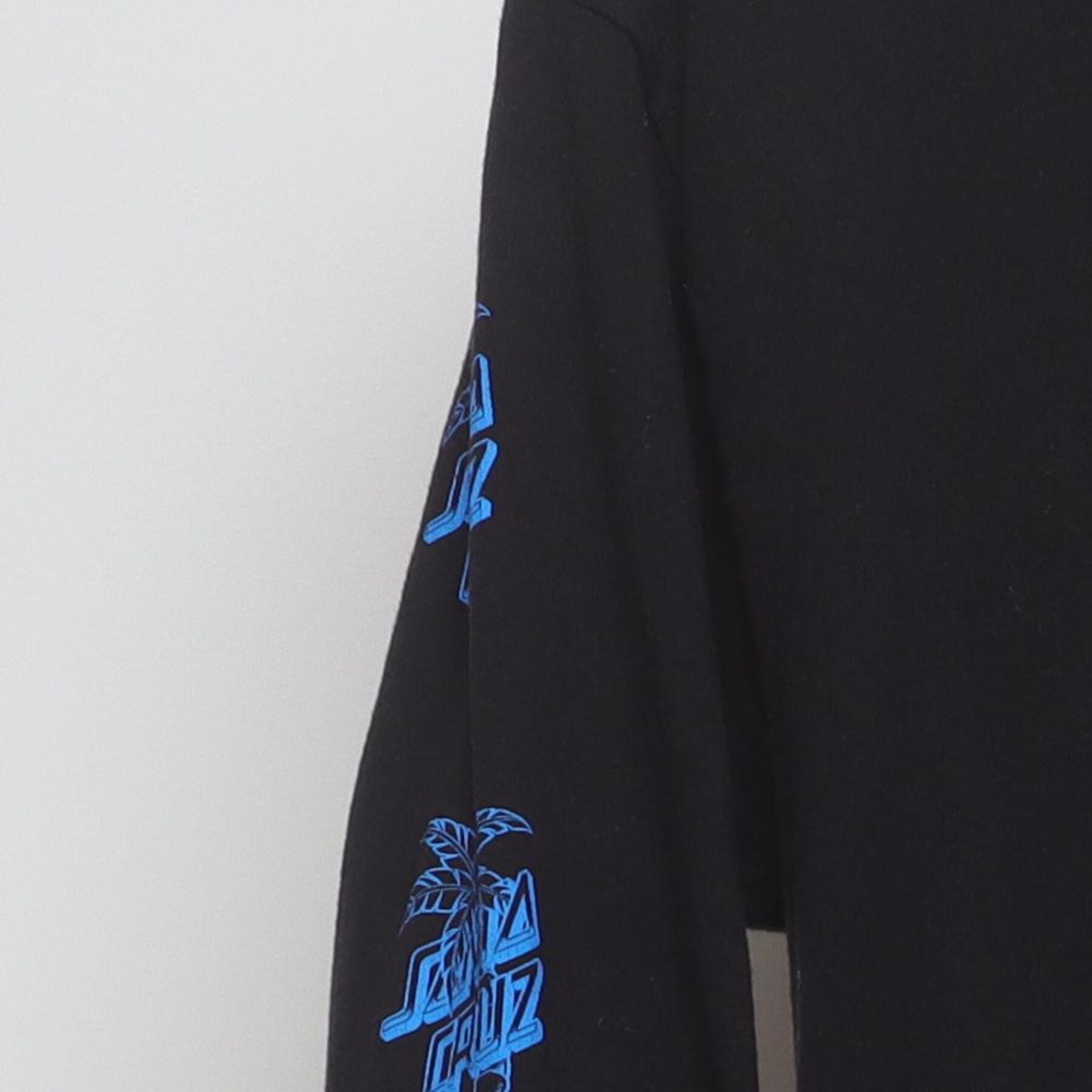 Close-up of the Left sleeve on the Vintage Y2K Santa Cruz "Volcano" Long Sleeve T-Shirt - S